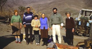 Fred Paillet, second from right, is pictured with a family in Armenia during his travels. Paillet teaches classes at the Osher Lifelong Learning Institute based at the University of Arkansas.