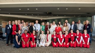 WE CARE-A-VAN group photo at Arkansas Children's Hospital, with nursing students