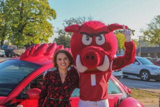 Dean Kate Mamiseishvili with U of A mascot, Big Red